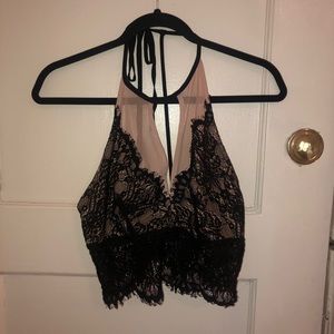 High neck lace going out top